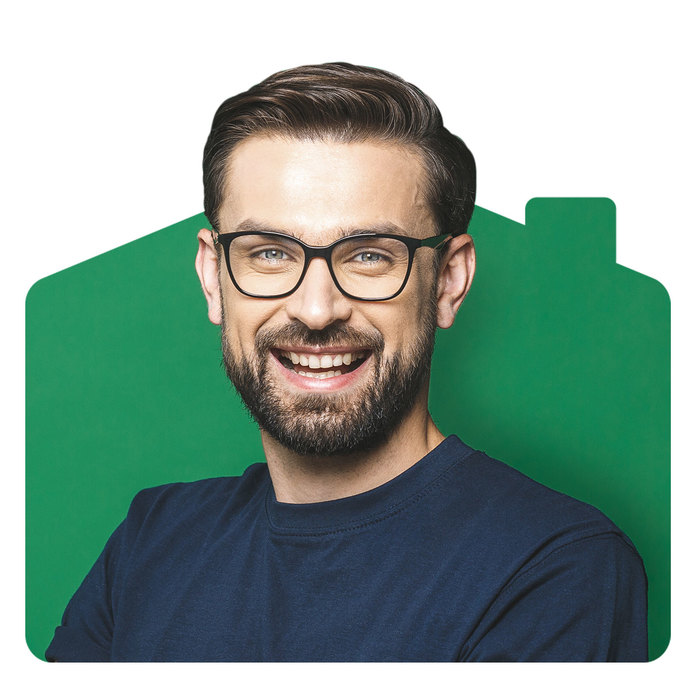 Happy smiling bearded man with glasses